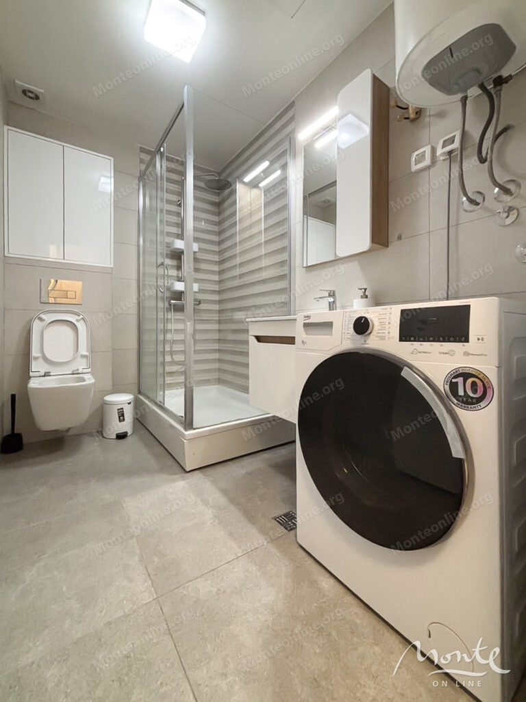 stilnaya meblirovannaya kvartira s 2 spalnyami v sovremennom dome v czentre podgoriczy 09