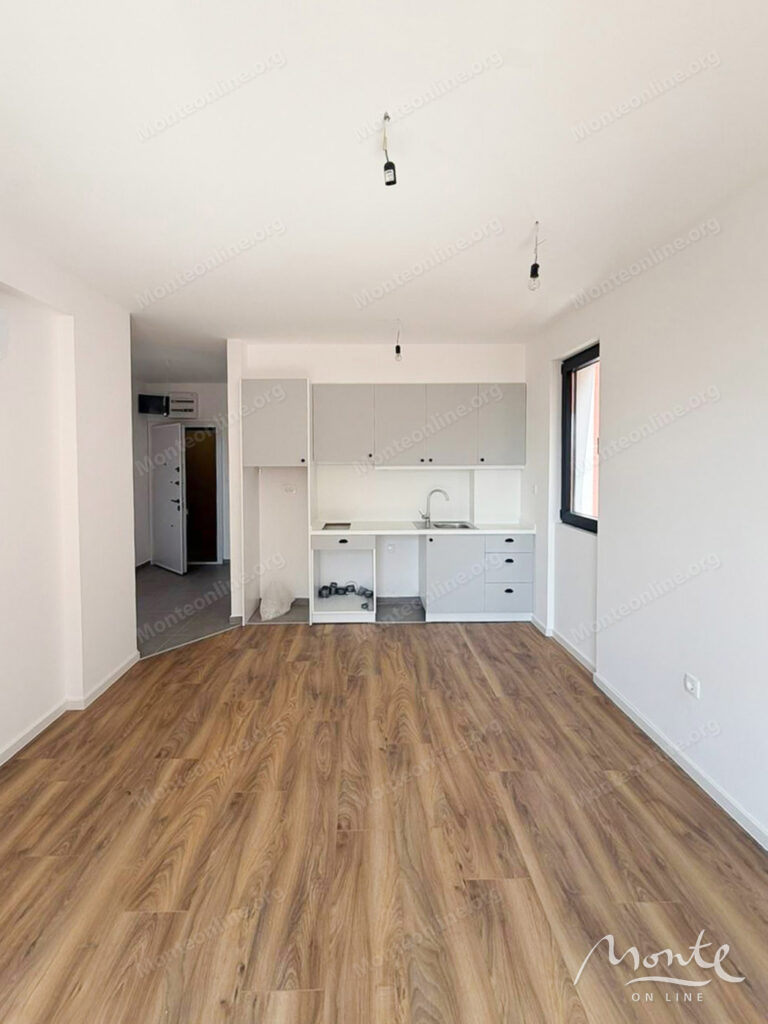 Two-bedroom apartment in a modern residential complex with a swimming pool in Budva 03