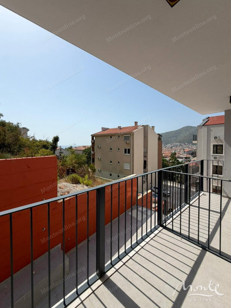Two-bedroom apartment in a modern residential complex with a swimming pool in Budva, 10