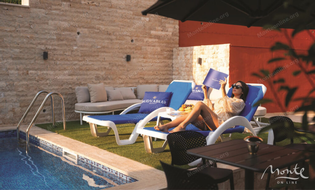 Two-bedroom apartment in a modern residential complex with a swimming pool in Budva 12