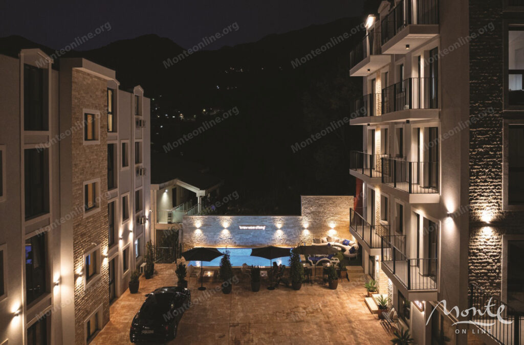 Two-bedroom apartment in a modern residential complex with a swimming pool in Budva 14