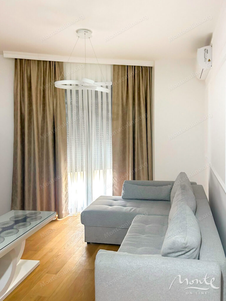 New apartment with 1 bedroom, terrace and garage space in Becici 02