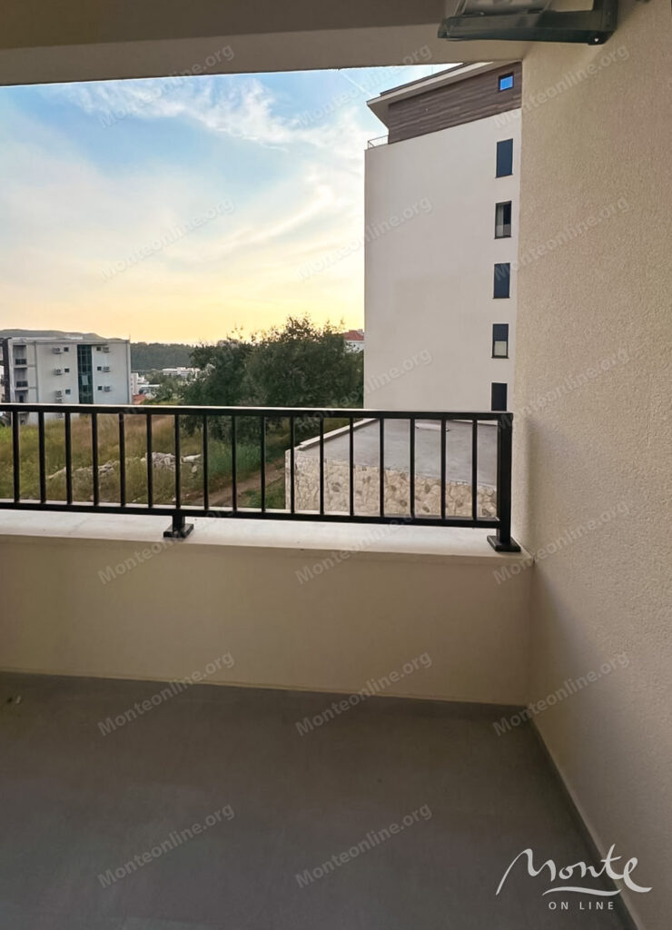 New apartment with 1 bedroom, terrace and garage space in Becici 12